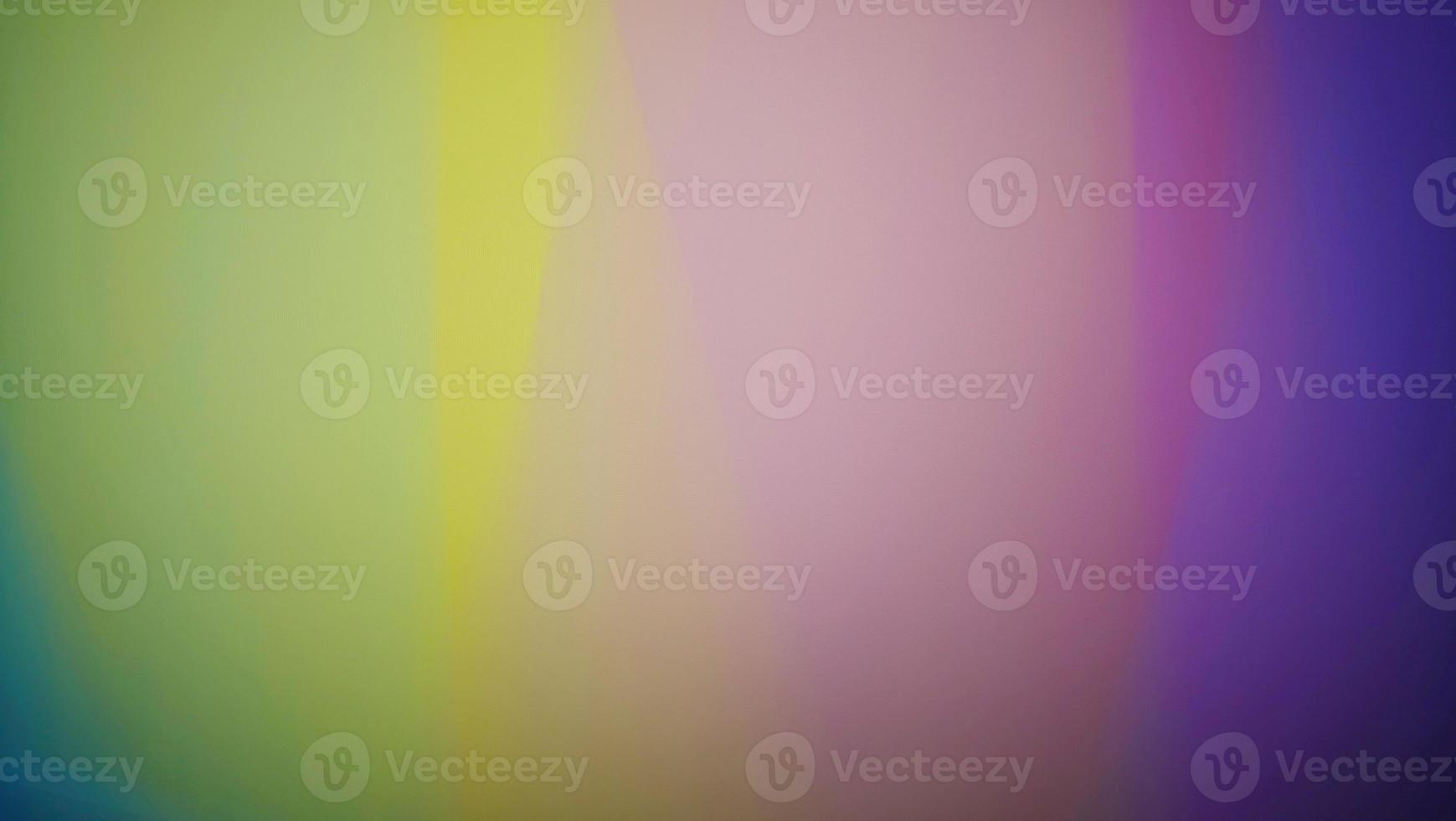 Smooth and blurry colorful gradient mesh background. Purple, yellow, green and black. photo