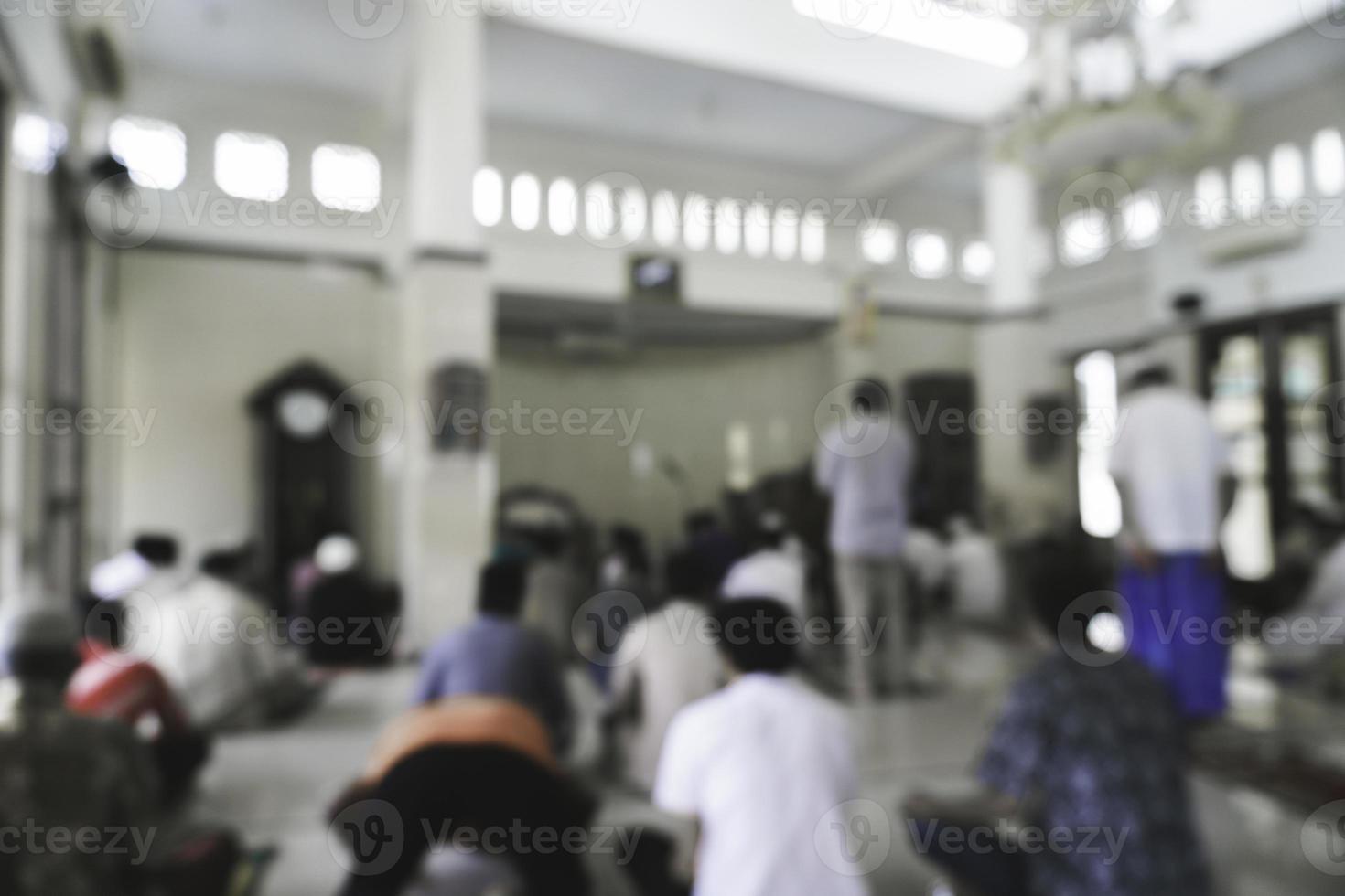 Blurry background islamic men pray in mosque in Friday. gathering in mosque. photo