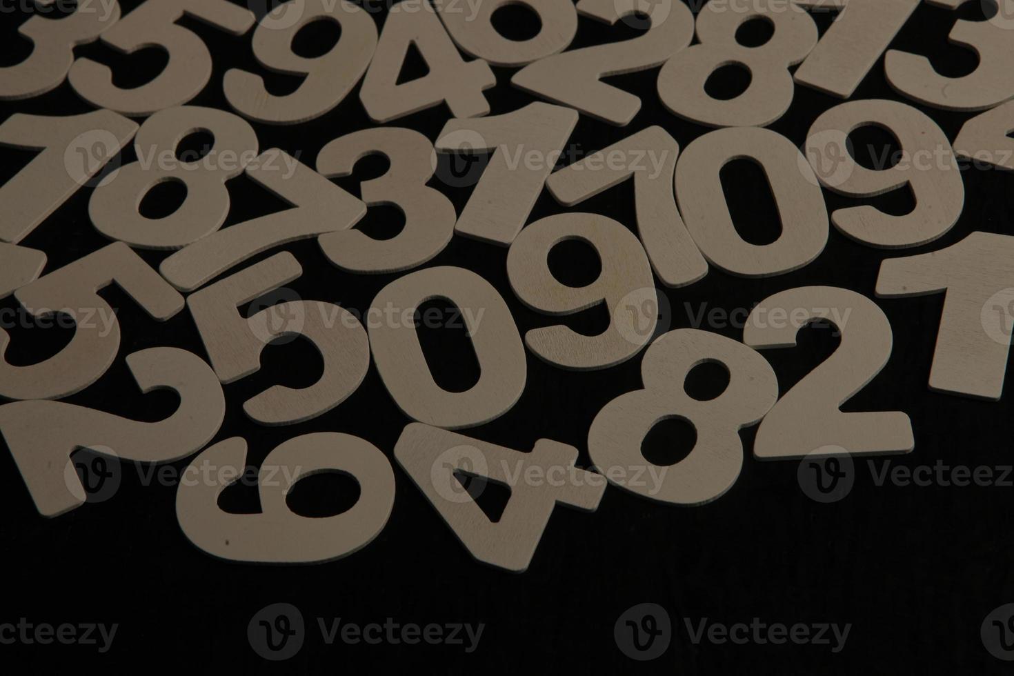 Colorful wooden numbers background. Numbers texture abstraction. Global economy crisis concept. Finance data pattern. photo