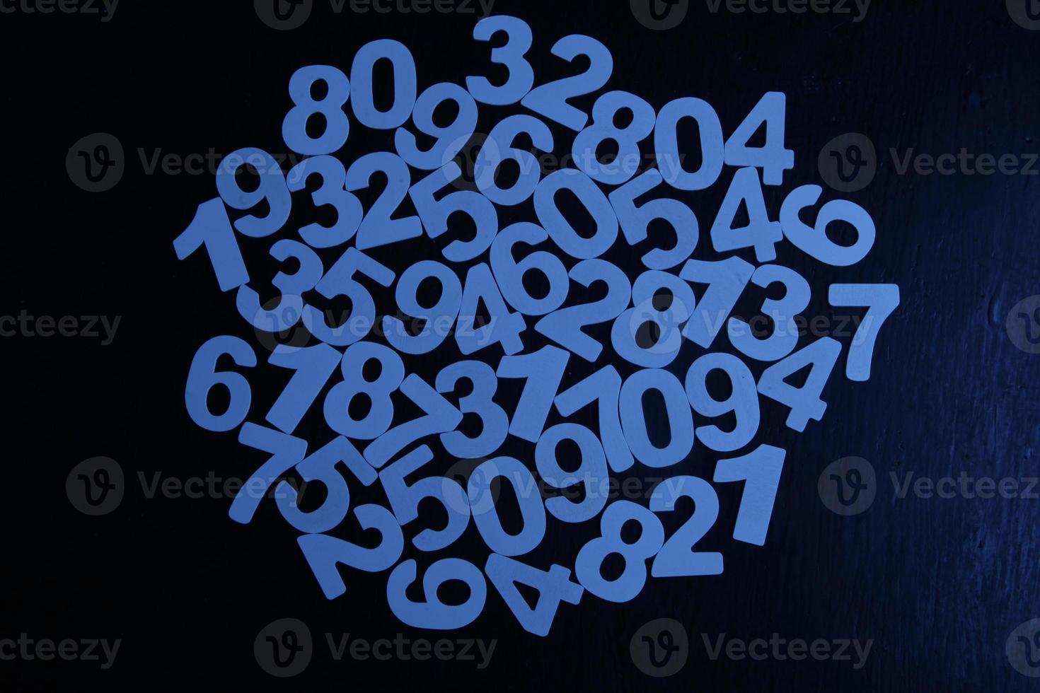 Colorful wooden numbers background. Numbers texture abstraction. Global economy crisis concept. Finance data pattern. photo