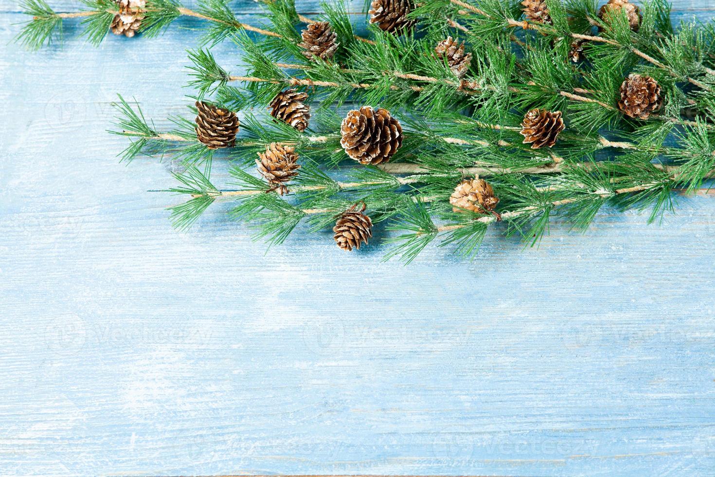 New Year or New Year's Eve background with fir branch with cones. The year 2023 is coming. photo