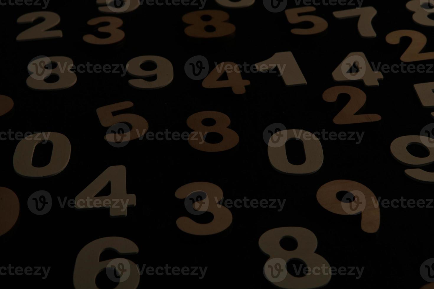 Colorful wooden numbers background. Numbers texture abstraction. Global economy crisis concept. Finance data pattern. photo