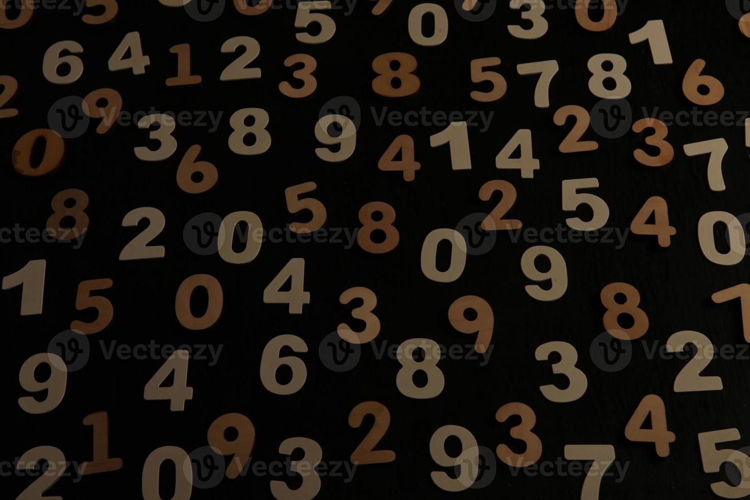 Colorful wooden numbers background. Numbers texture abstraction. Global economy crisis concept. Finance data pattern. photo