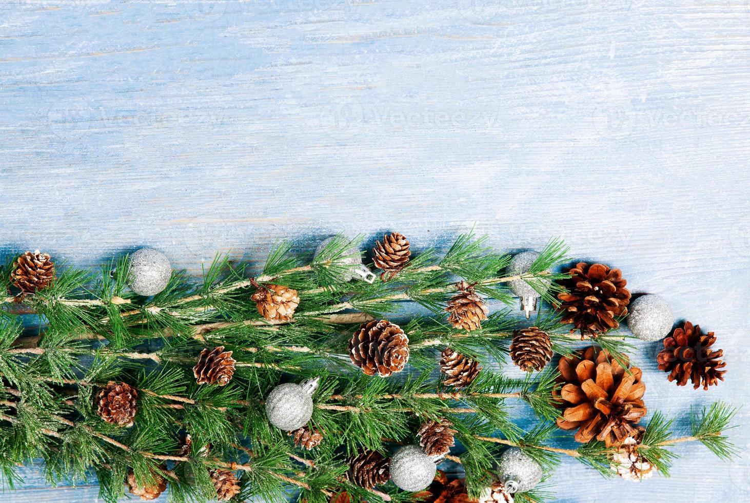 New Year or New Year's Eve background with fir branch with cones. The year 2023 is coming. photo
