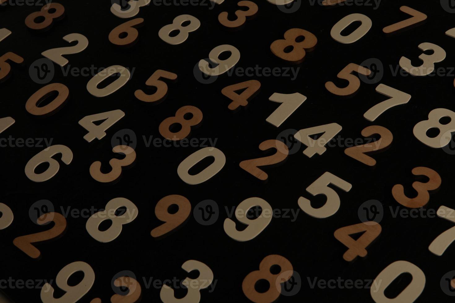 Colorful wooden numbers background. Numbers texture abstraction. Global economy crisis concept. Finance data pattern. photo