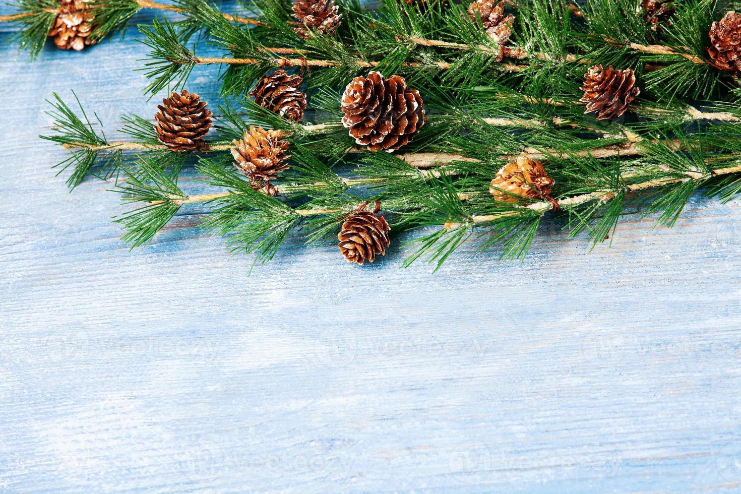 New Year or New Year's Eve background with fir branch with cones. The year 2023 is coming. photo