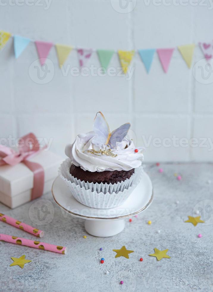 Cupcakes with butterfly decorations photo