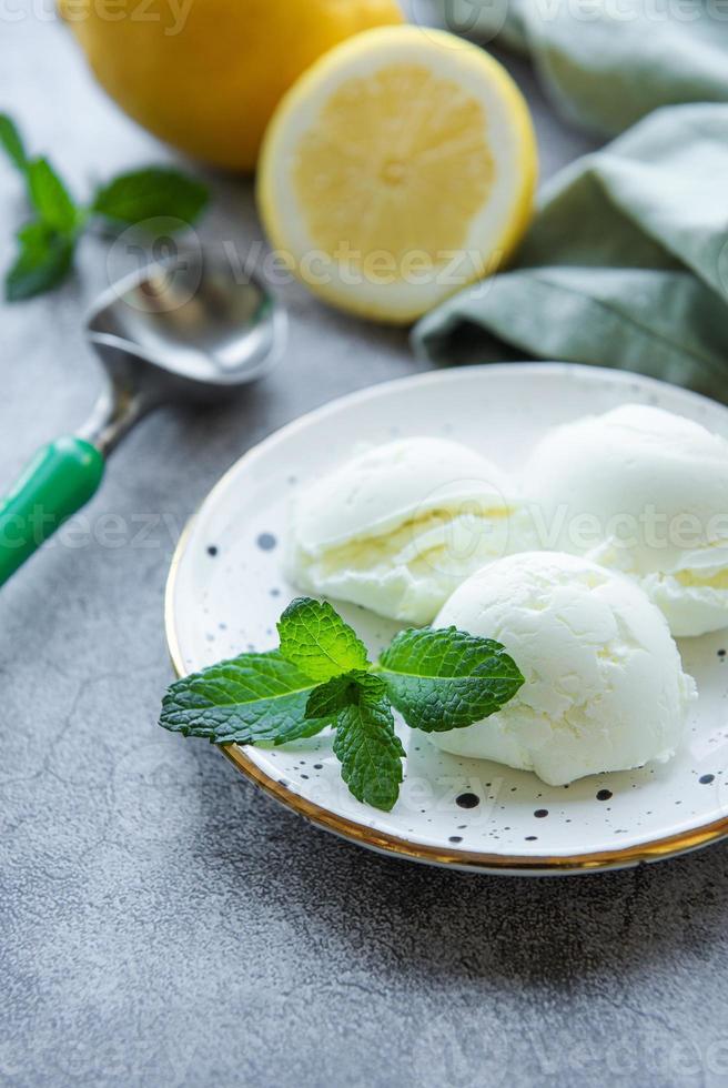 Homemade citrus lemon ice cream with mint photo