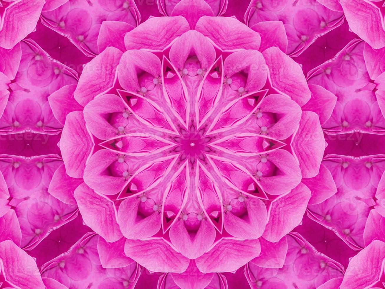 Magenta floral kaleidoscope pattern. Pink flower abstract unique and aesthetic background photo