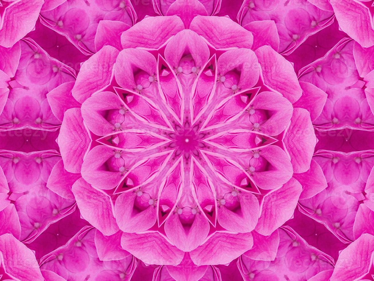 Magenta floral kaleidoscope pattern. Pink flower abstract unique and aesthetic background photo