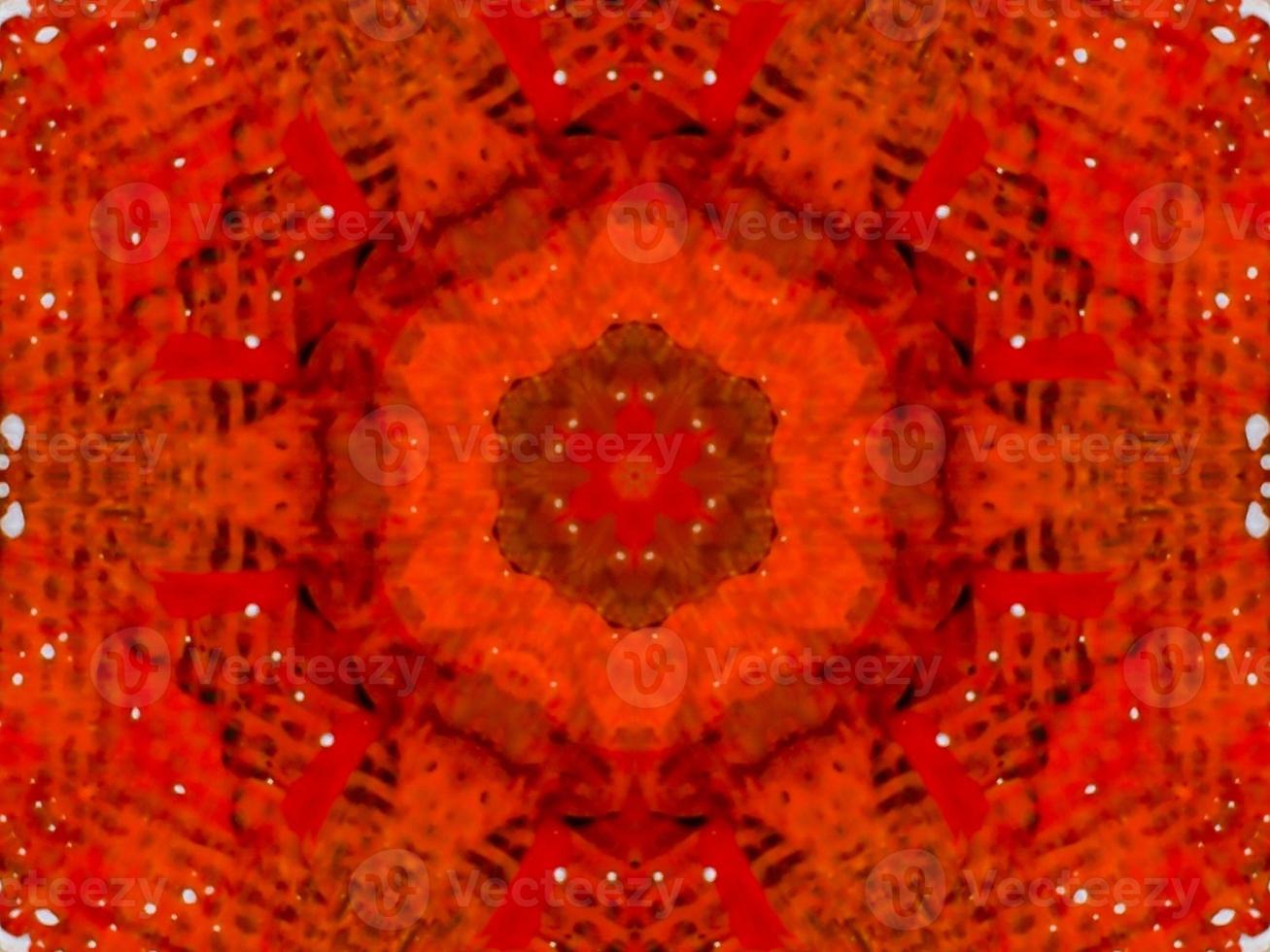 Colorful red fire kaleidoscope background abstract flower and symmetric pattern photo