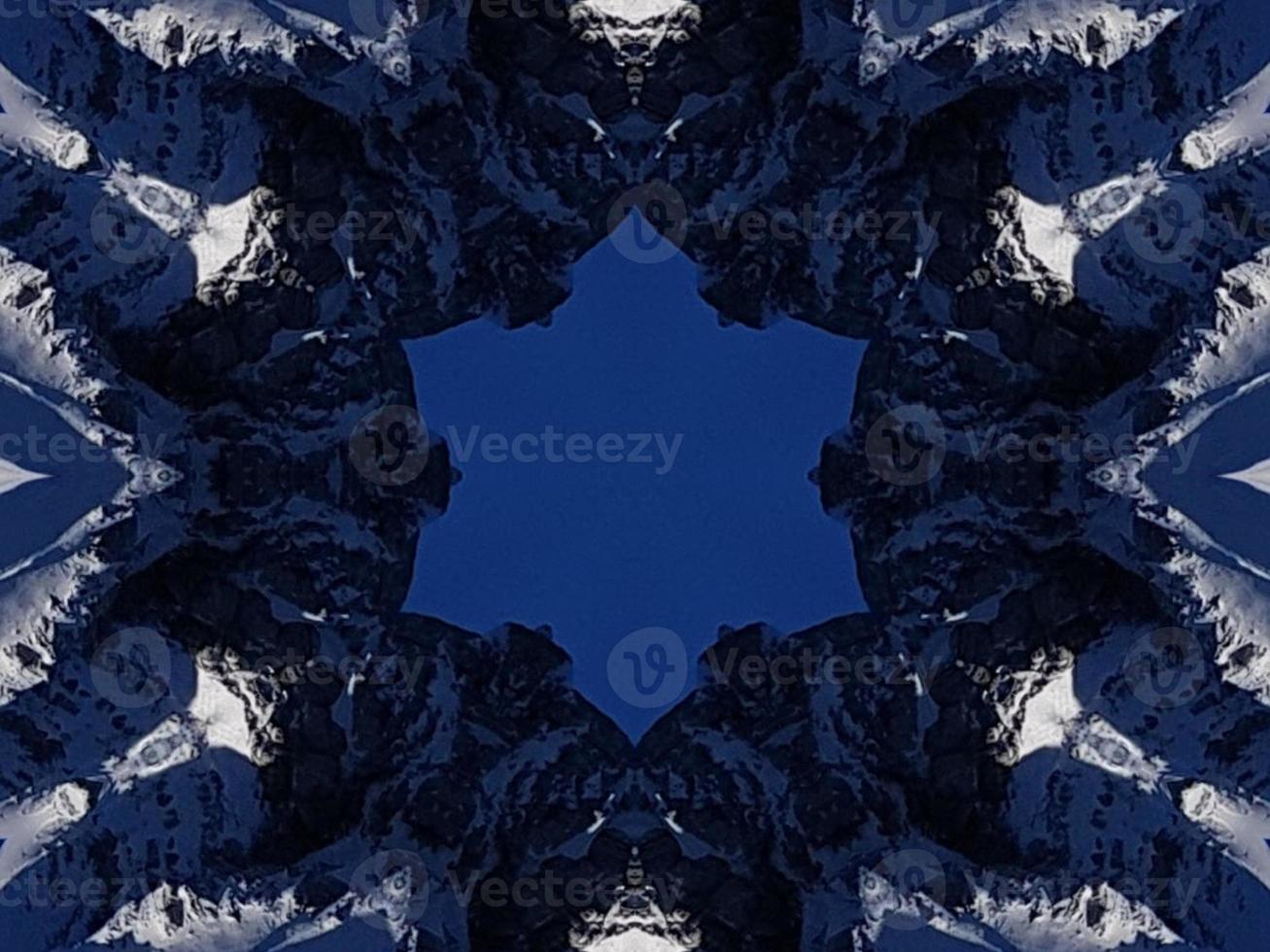 Dark blue sky floral abstract background kaleidoscope unique and aesthetic pattern photo