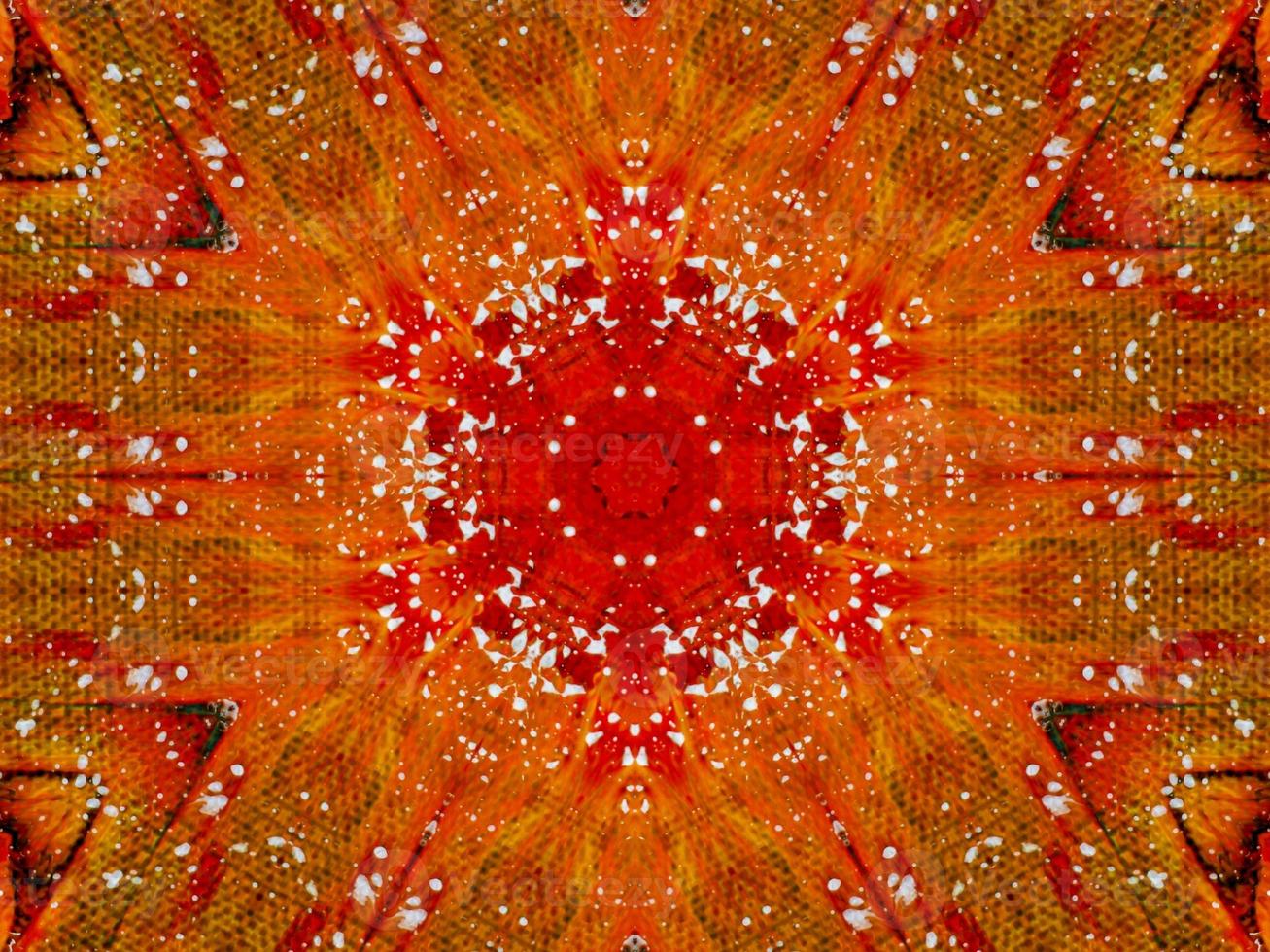 Colorful red fire kaleidoscope background abstract flower and symmetric pattern photo