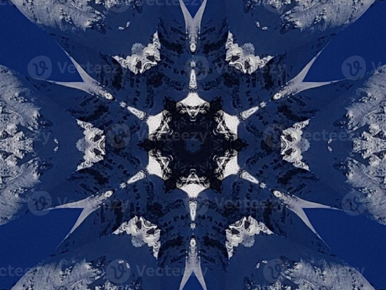 Dark blue sky floral abstract background kaleidoscope unique and aesthetic pattern photo