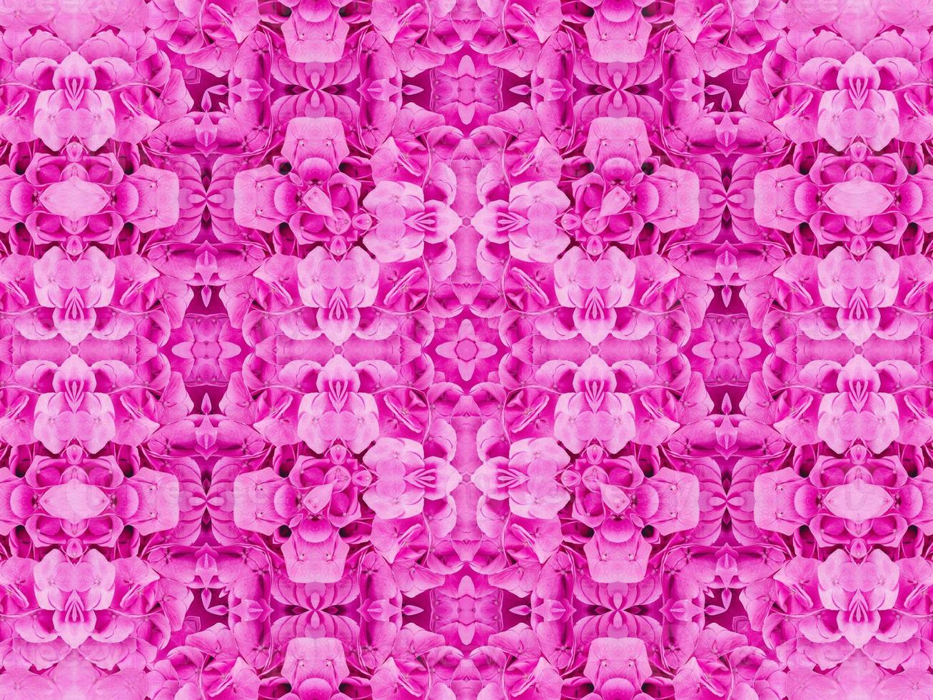 Magenta floral kaleidoscope pattern. Pink flower abstract unique and aesthetic background photo
