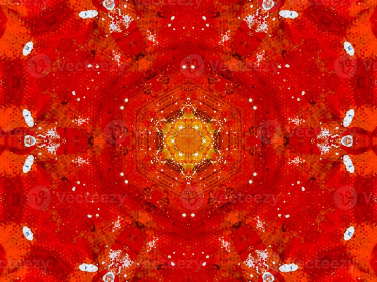 Colorful red fire kaleidoscope background abstract flower and symmetric pattern photo