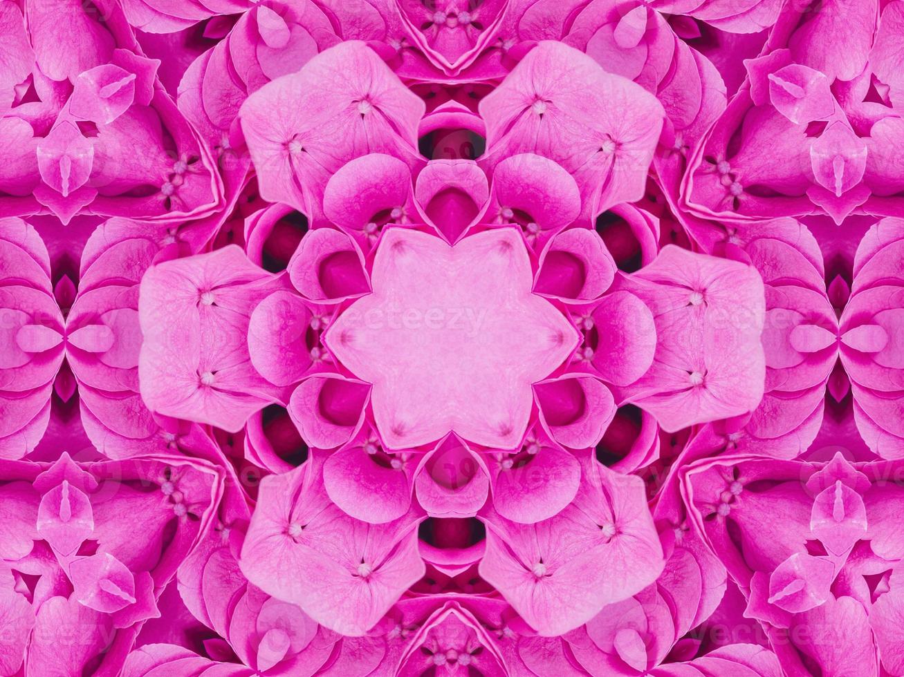 Magenta floral kaleidoscope pattern. Pink flower abstract unique and aesthetic background photo