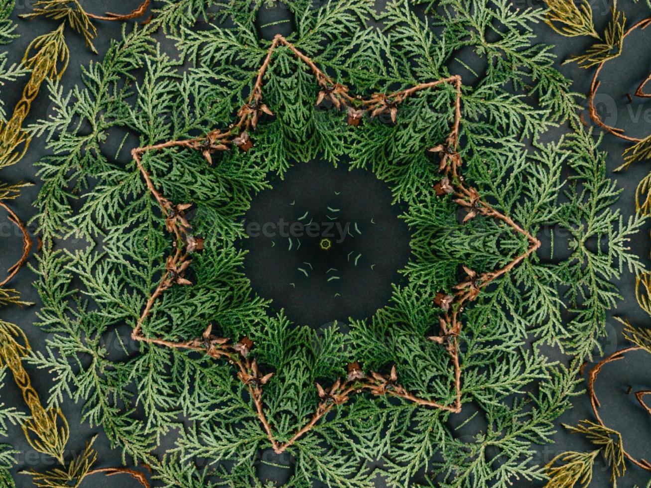 Black abstract kaleidoscope background with leaves ornament for christmas vibes pattern photo