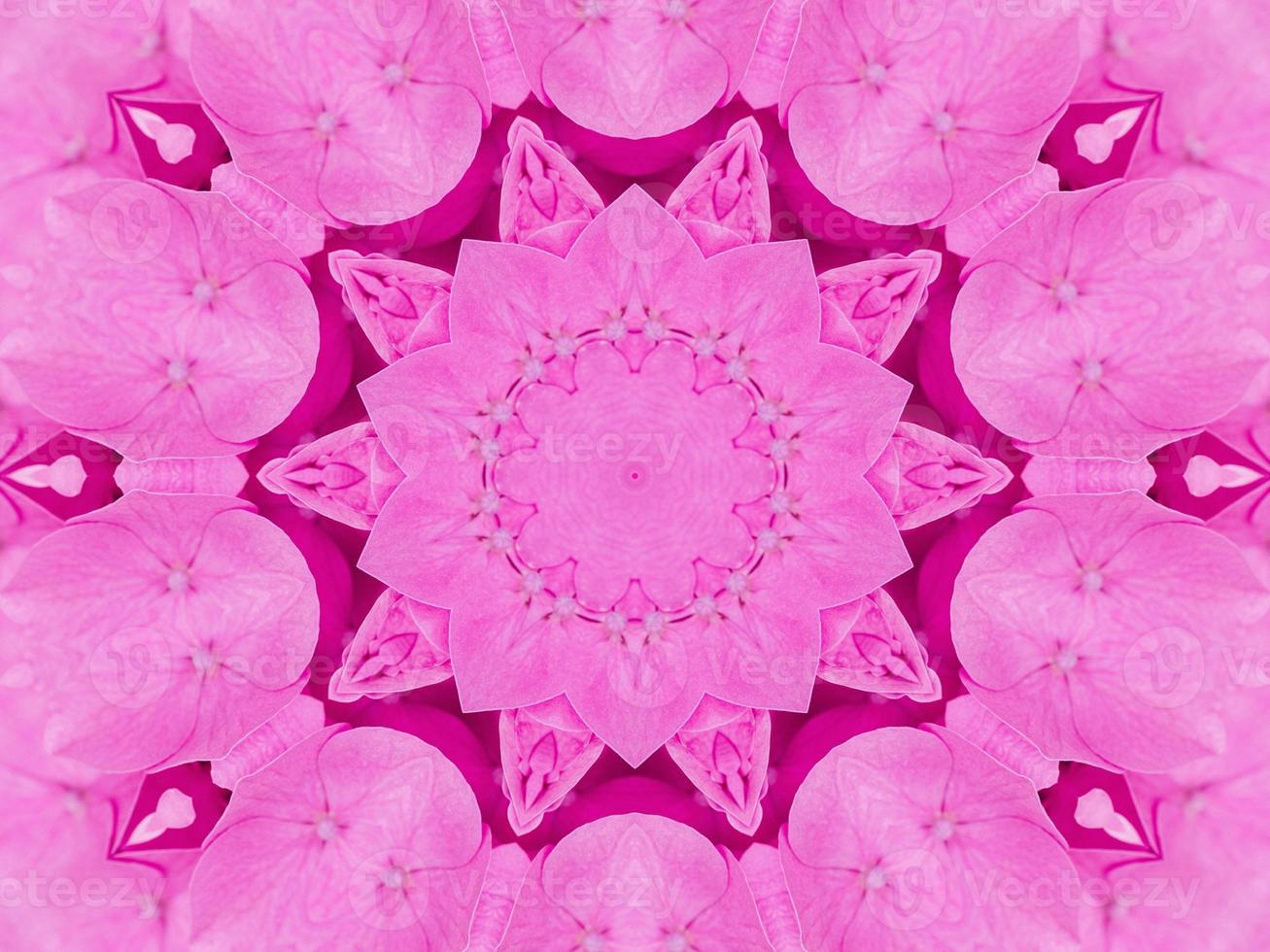 Magenta floral kaleidoscope pattern. Pink flower abstract unique and aesthetic background photo