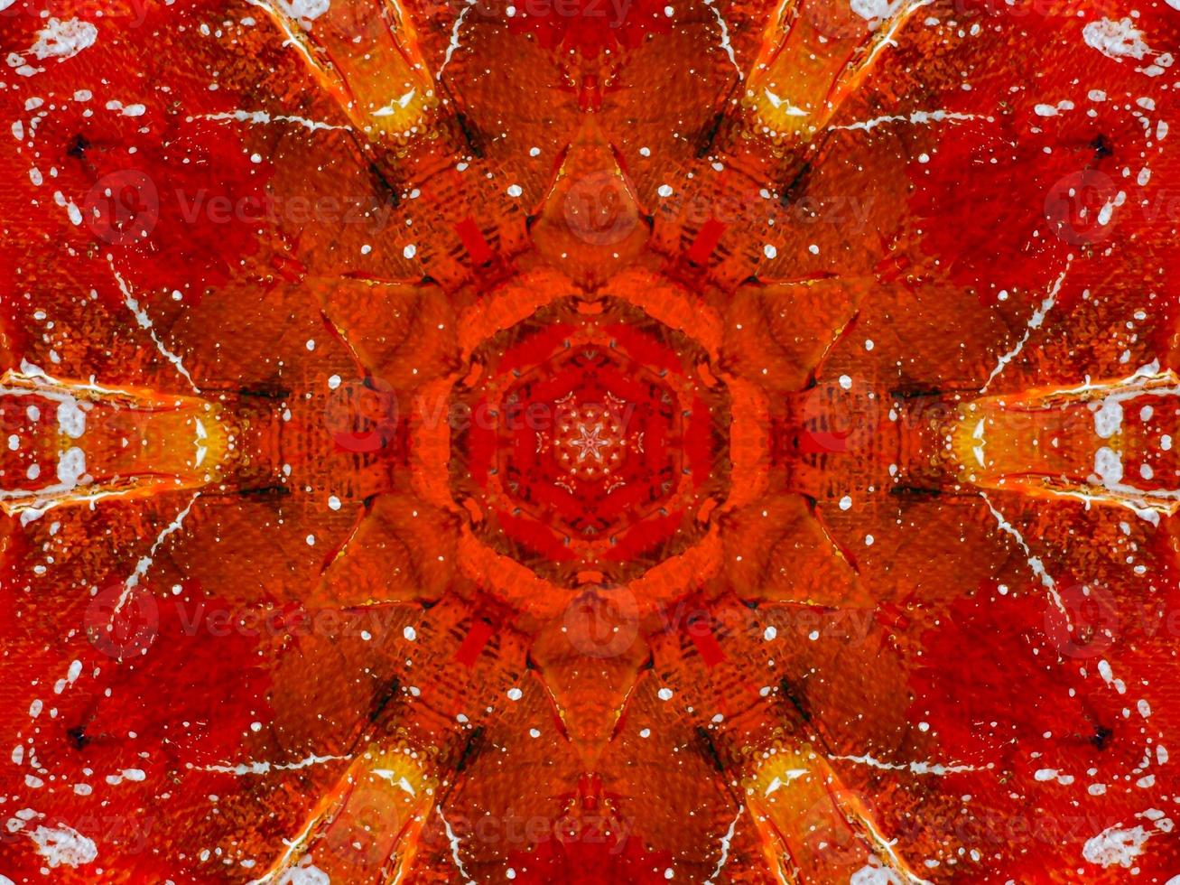 Colorful red fire kaleidoscope background abstract flower and symmetric pattern photo