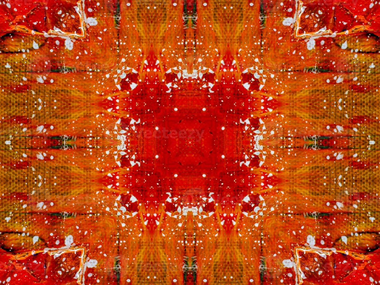 Colorful red fire kaleidoscope background abstract flower and symmetric pattern photo