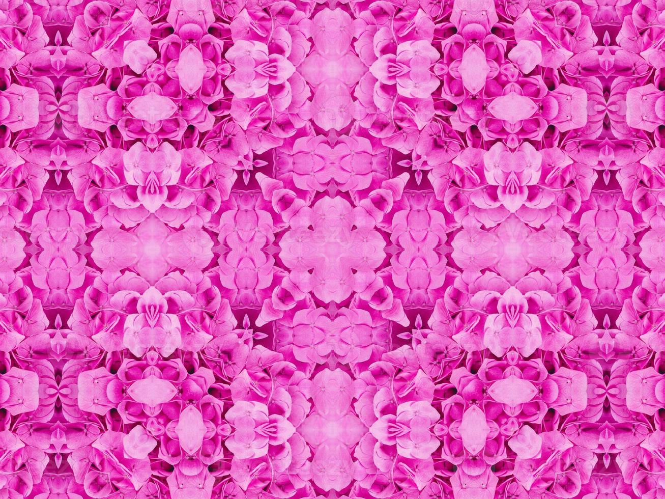 Magenta floral kaleidoscope pattern. Pink flower abstract unique and aesthetic background photo