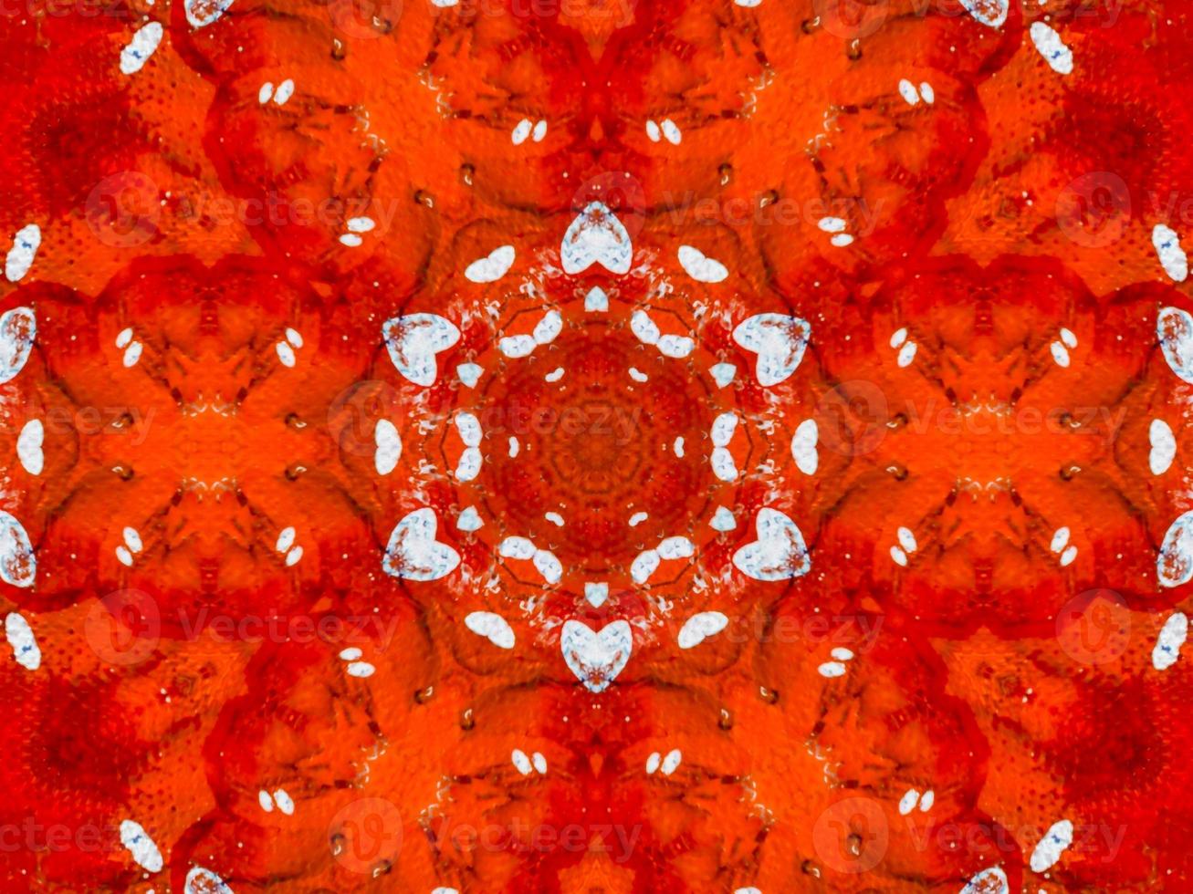 Colorful red fire kaleidoscope background abstract flower and symmetric pattern photo