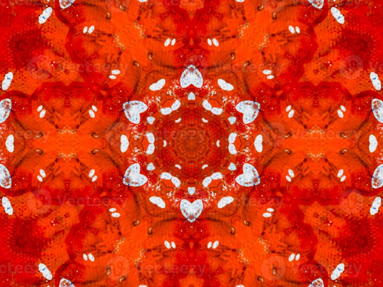 Fondo de caleidoscopio de fuego rojo colorido flor abstracta y patrón simétrico foto