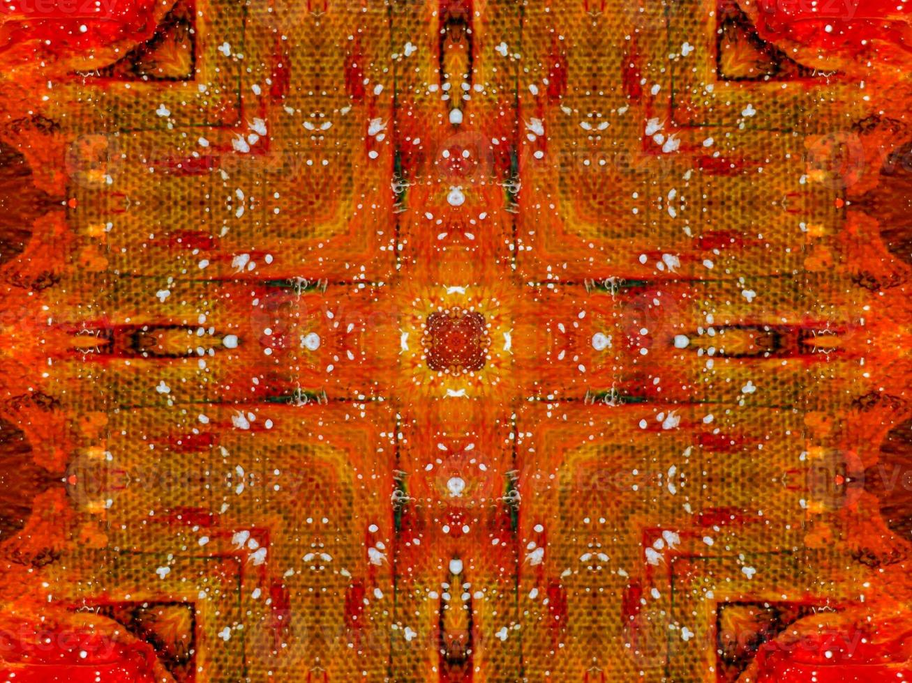 Colorful red fire kaleidoscope background abstract flower and symmetric pattern photo