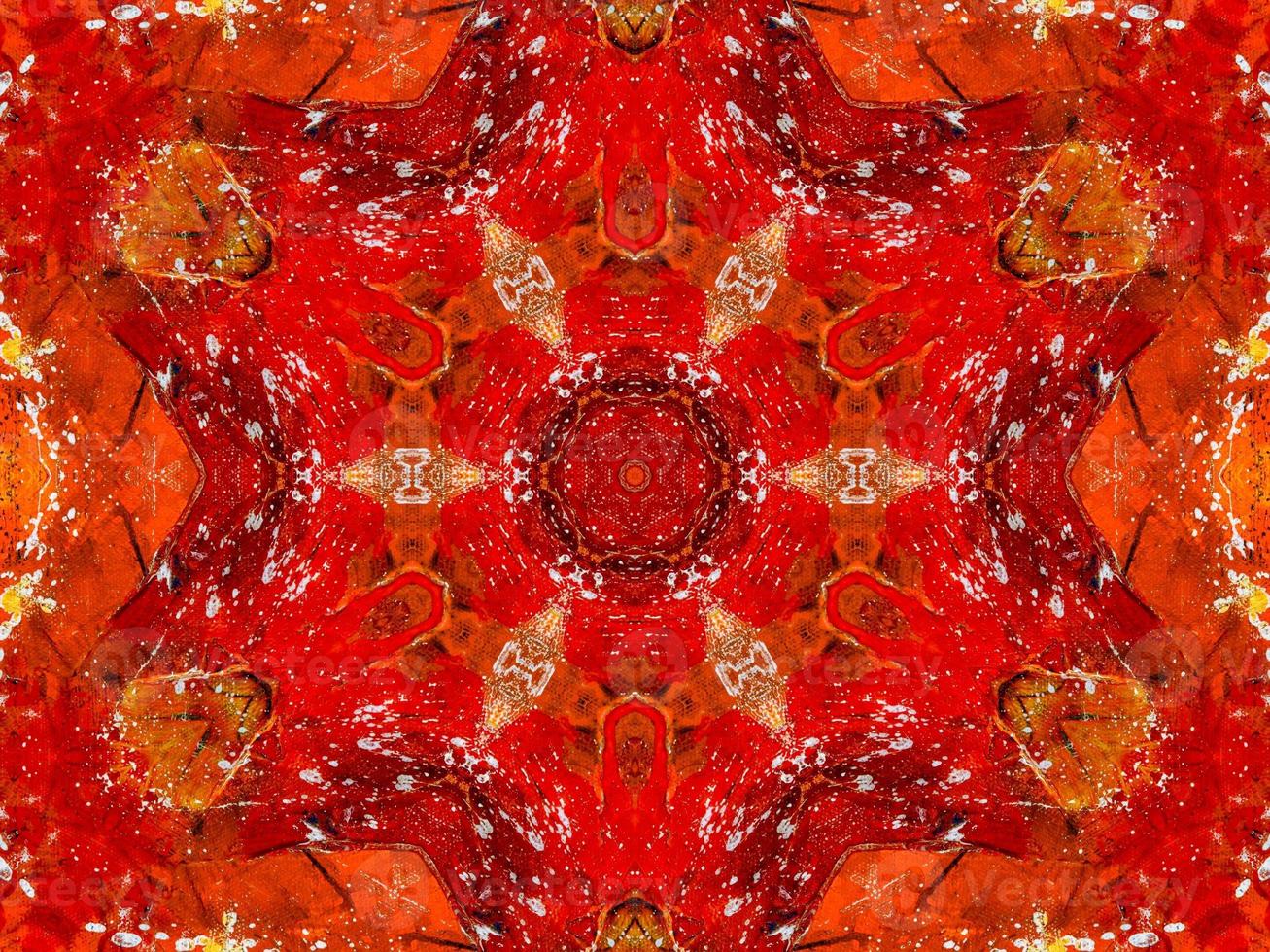 Colorful red fire kaleidoscope background abstract flower and symmetric pattern photo