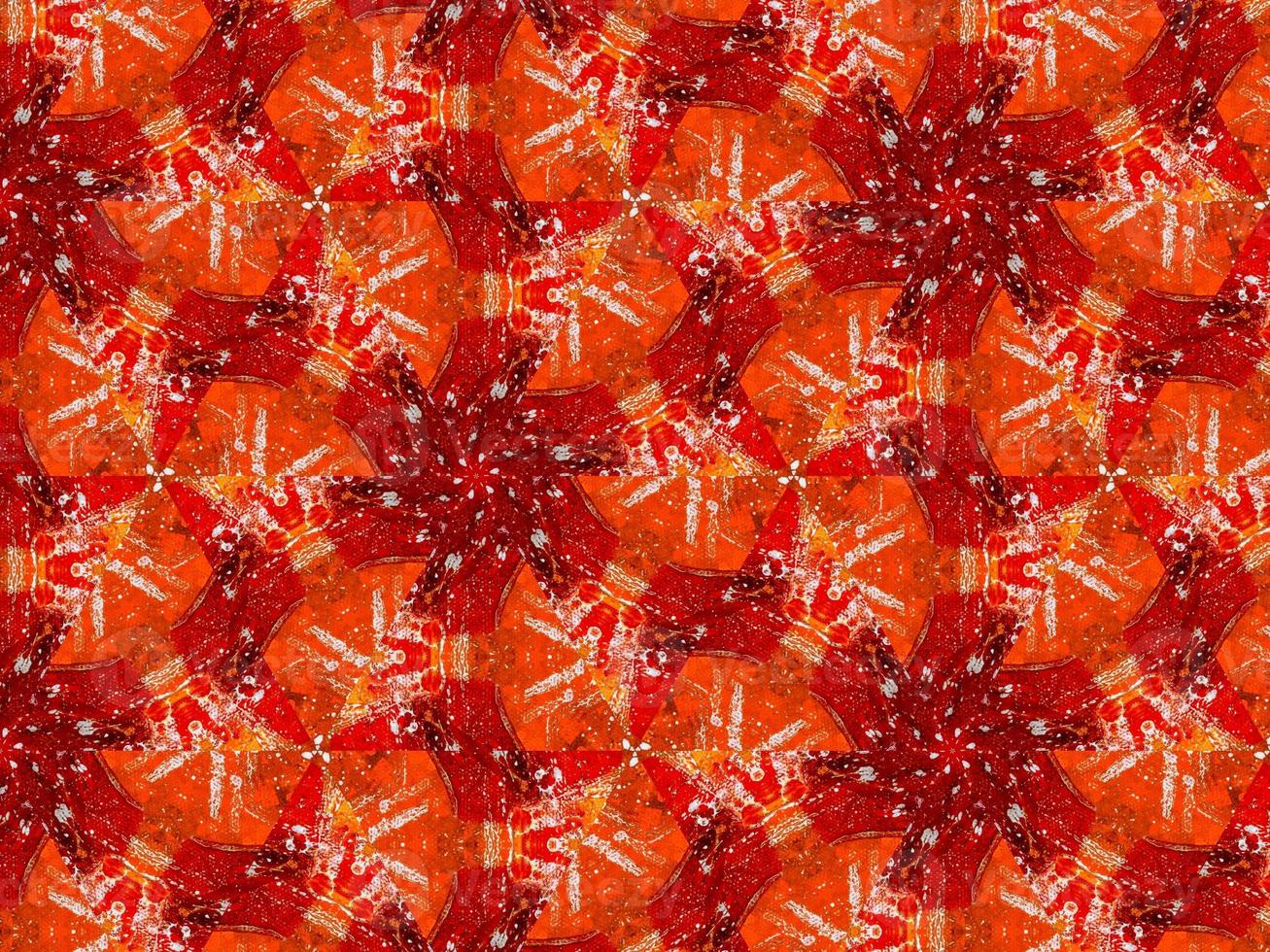 Colorful red fire kaleidoscope background abstract flower and symmetric pattern photo