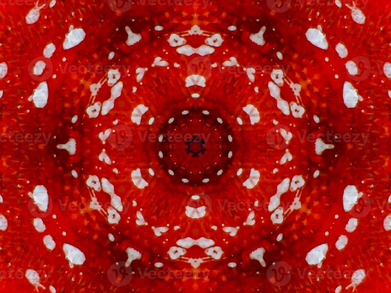 Colorful red fire kaleidoscope background abstract flower and symmetric pattern photo