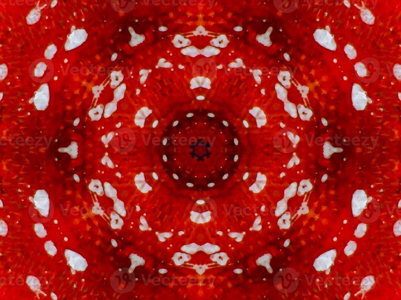 Colorful red fire kaleidoscope background abstract flower and symmetric pattern photo