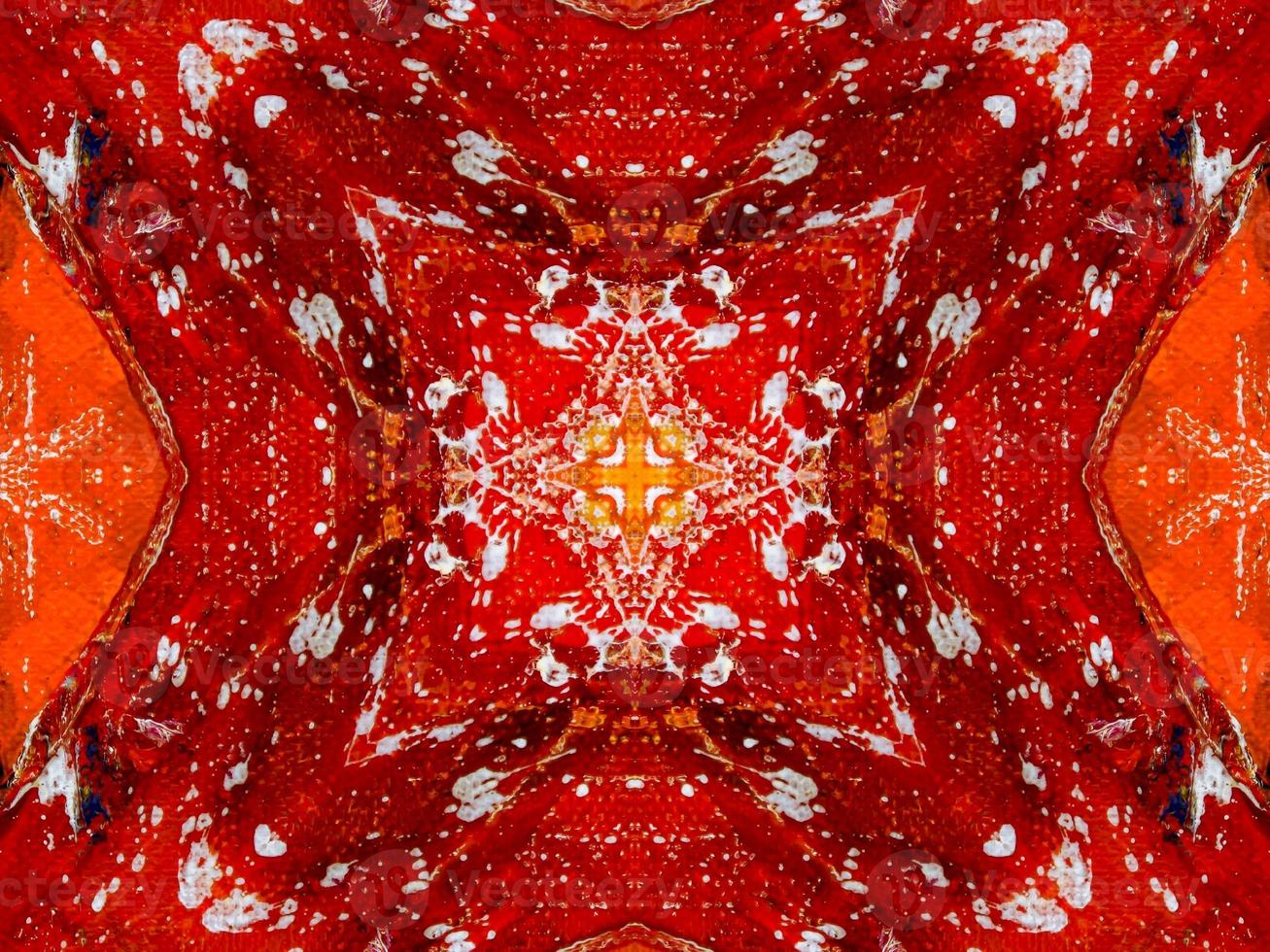Colorful red fire kaleidoscope background abstract flower and symmetric pattern photo