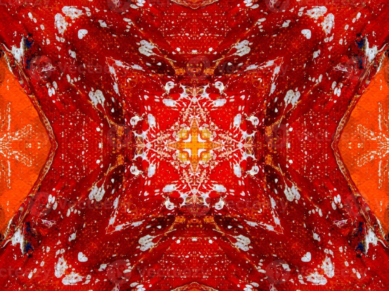 Colorful red fire kaleidoscope background abstract flower and symmetric pattern photo