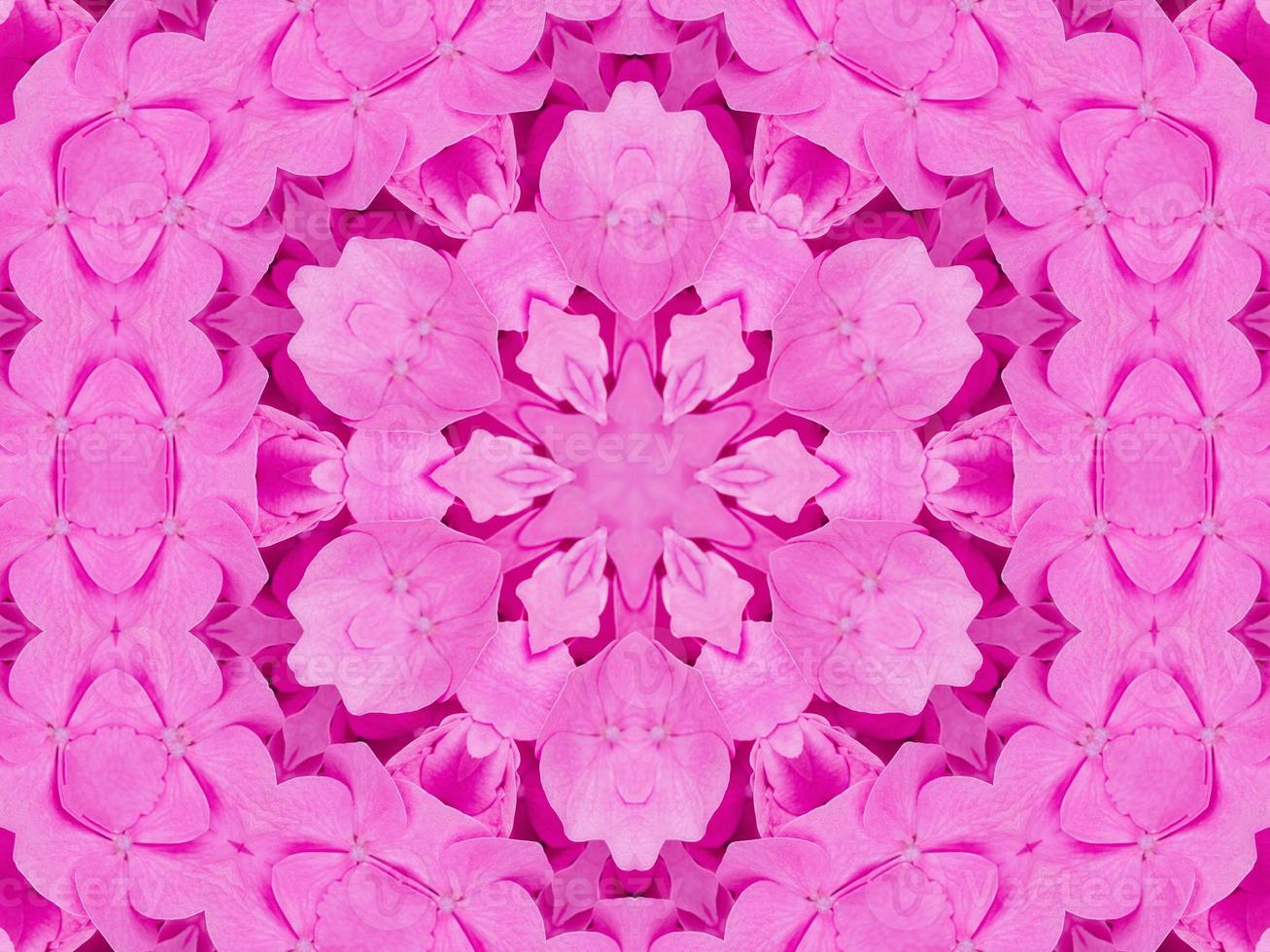 Magenta floral kaleidoscope pattern. Pink flower abstract unique and aesthetic background photo