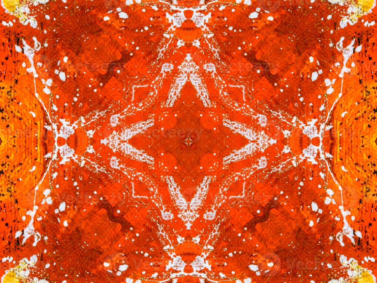 Colorful red fire kaleidoscope background abstract flower and symmetric pattern photo