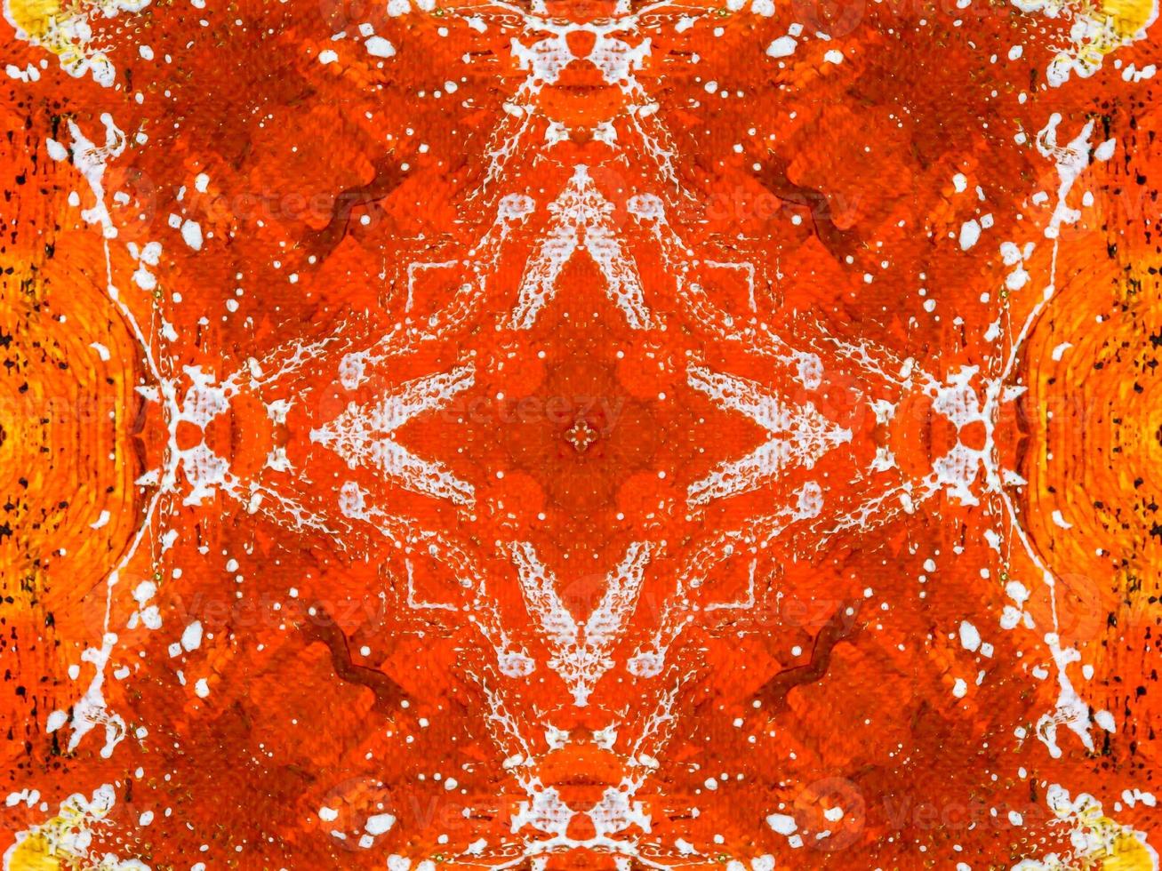 Colorful red fire kaleidoscope background abstract flower and symmetric pattern photo