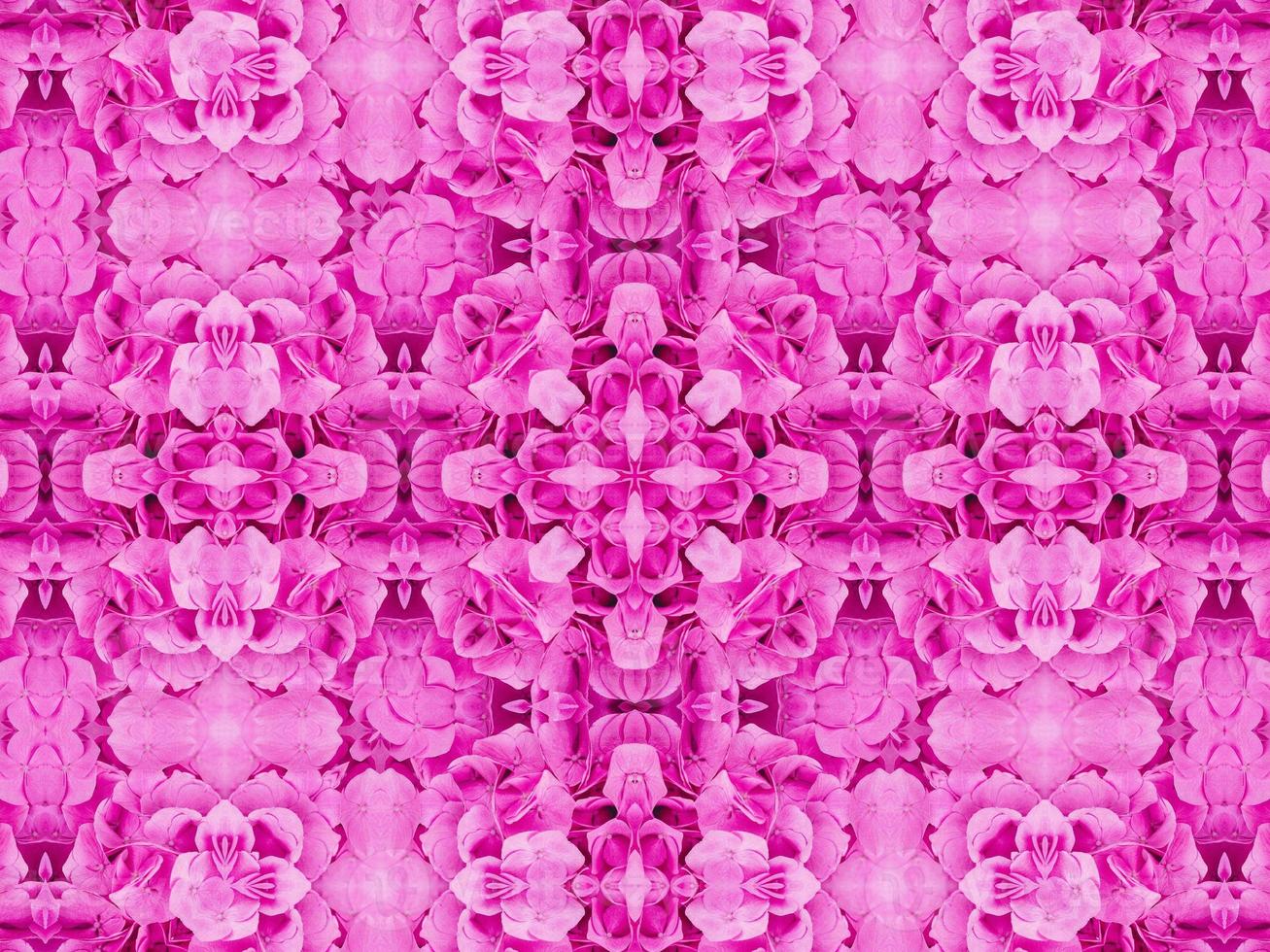 Magenta floral kaleidoscope pattern. Pink flower abstract unique and aesthetic background photo