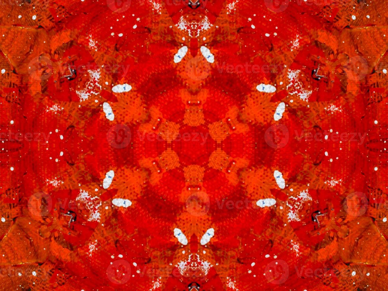 Colorful red fire kaleidoscope background abstract flower and symmetric pattern photo