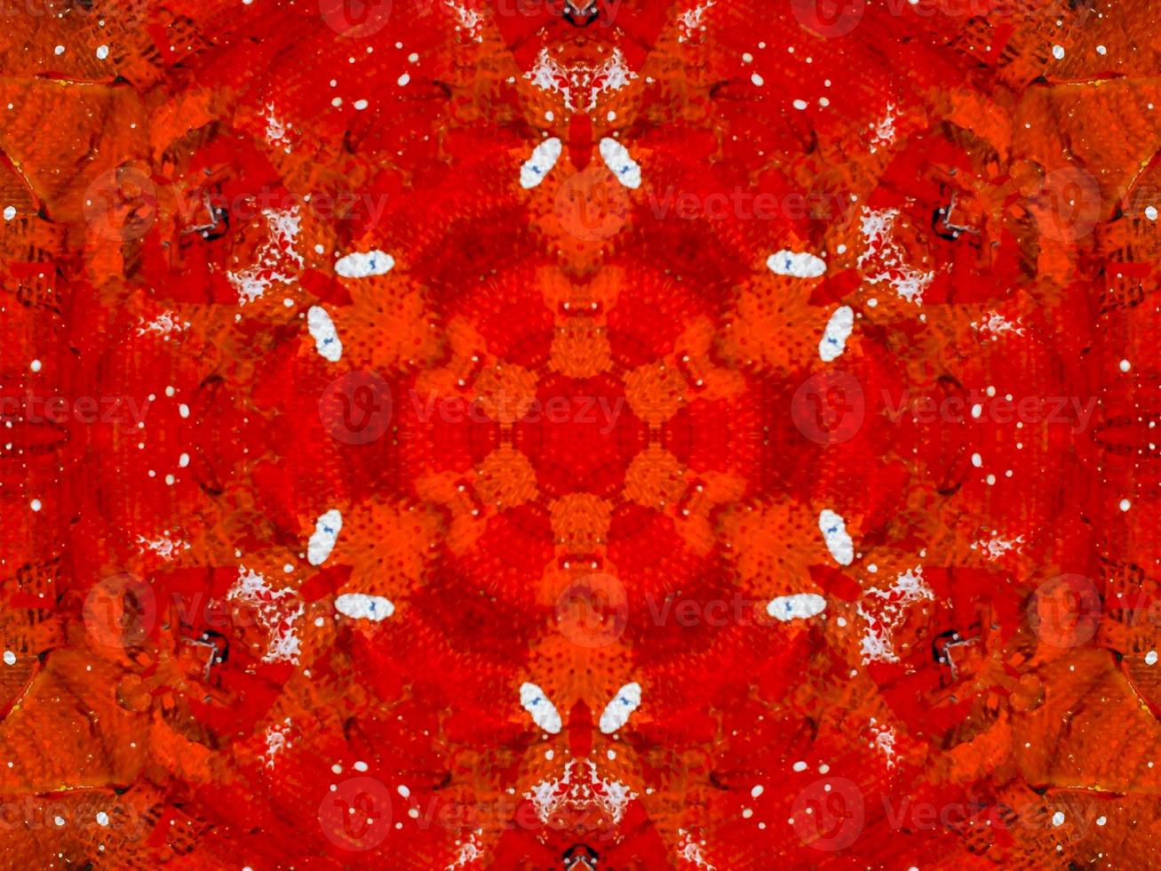 Colorful red fire kaleidoscope background abstract flower and symmetric pattern photo