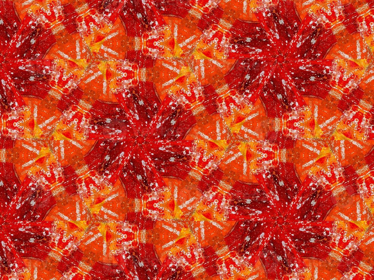 Colorful red fire kaleidoscope background abstract flower and symmetric pattern photo