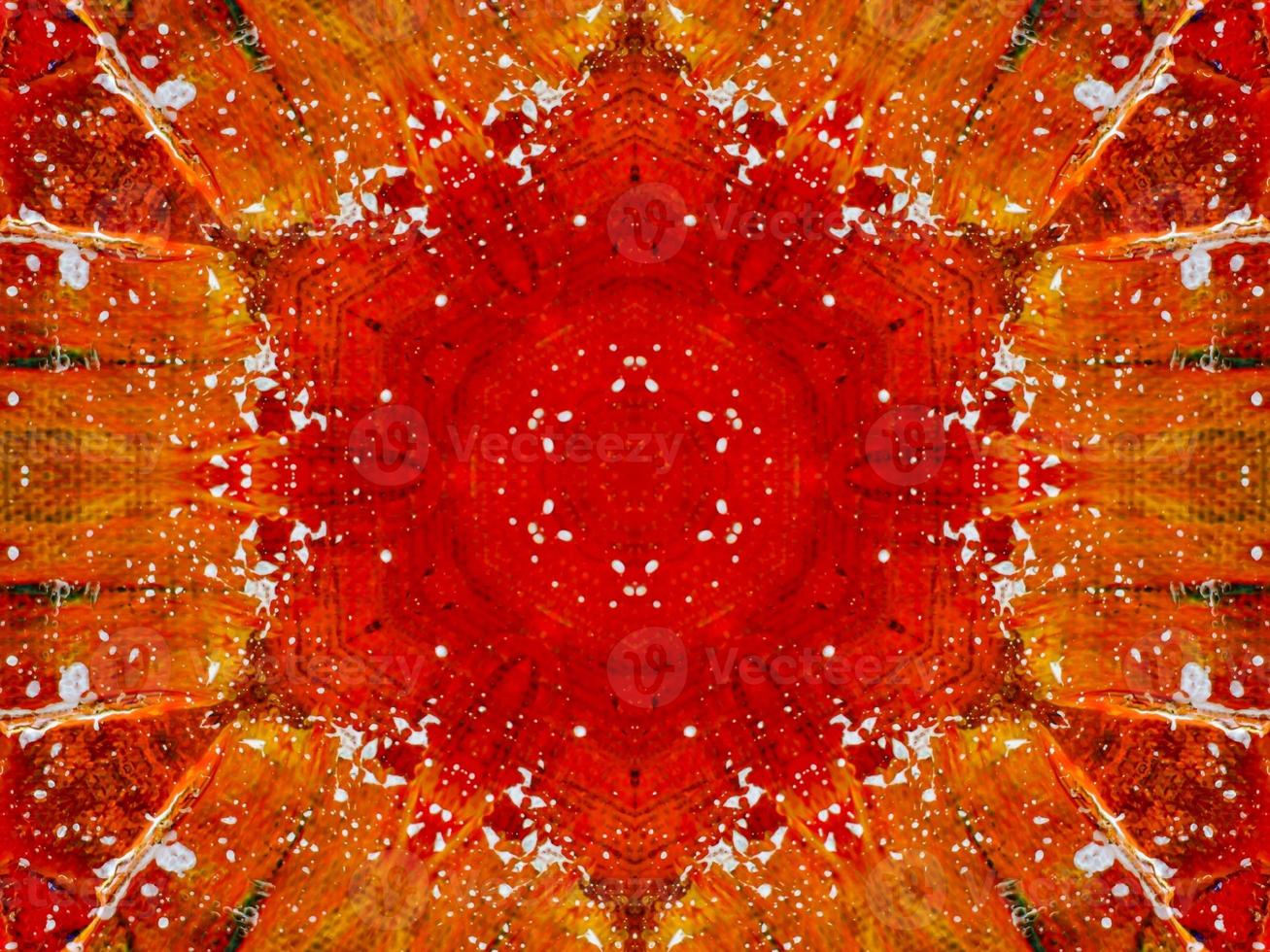 Colorful red fire kaleidoscope background abstract flower and symmetric pattern photo