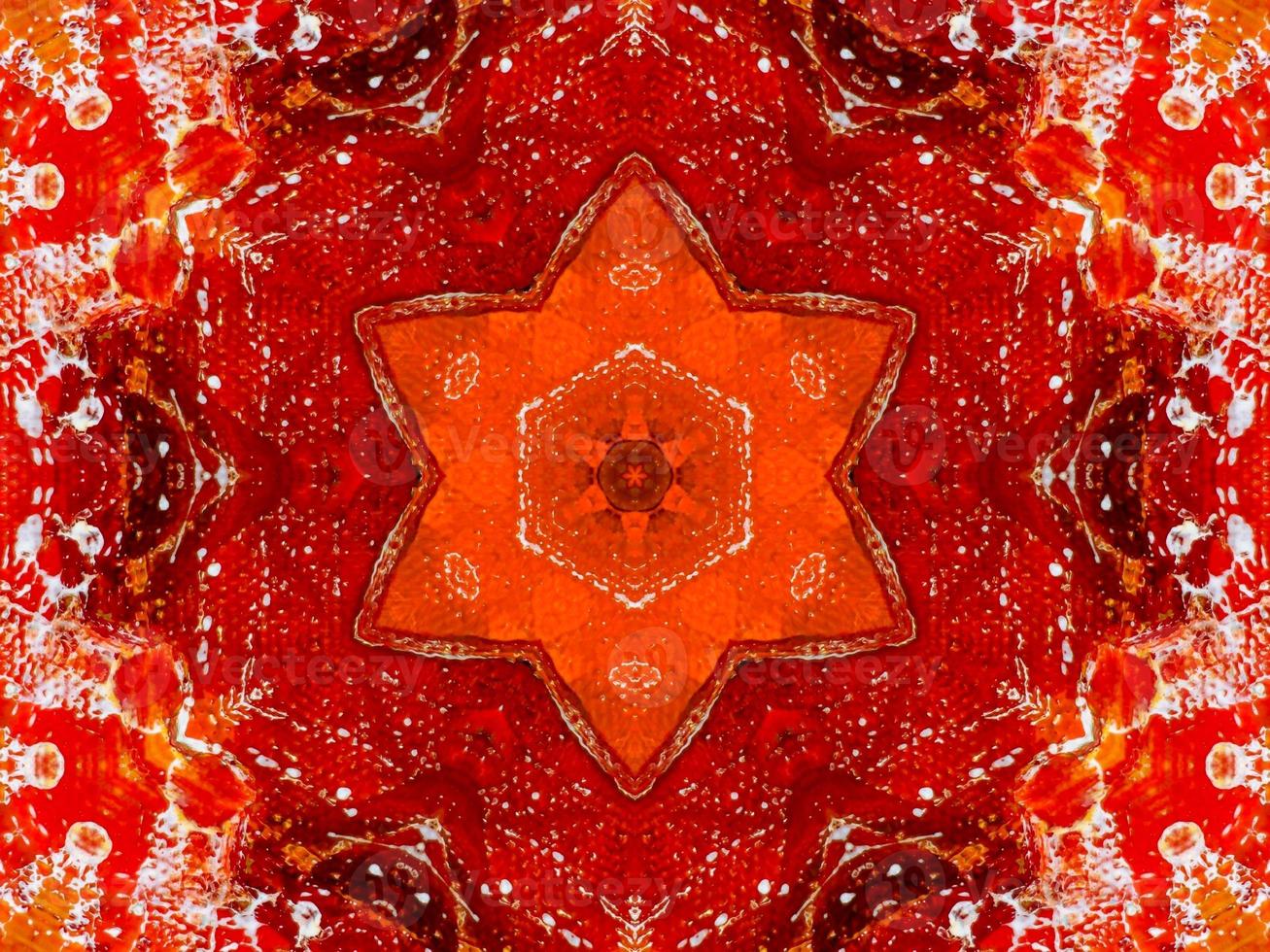 Colorful red fire kaleidoscope background abstract flower and symmetric pattern photo