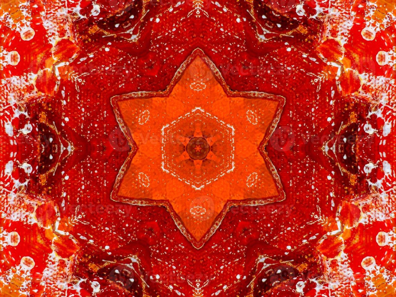 Colorful red fire kaleidoscope background abstract flower and symmetric pattern photo