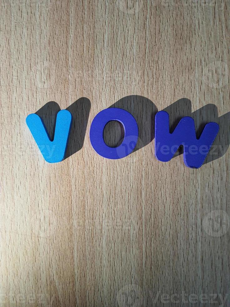 The arrangement of blue letters that read VOW photo