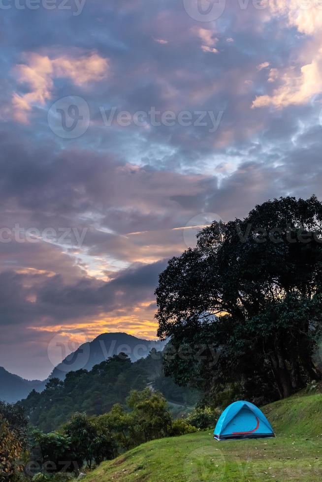 mountain landscape and tent dramatic evening sky photo