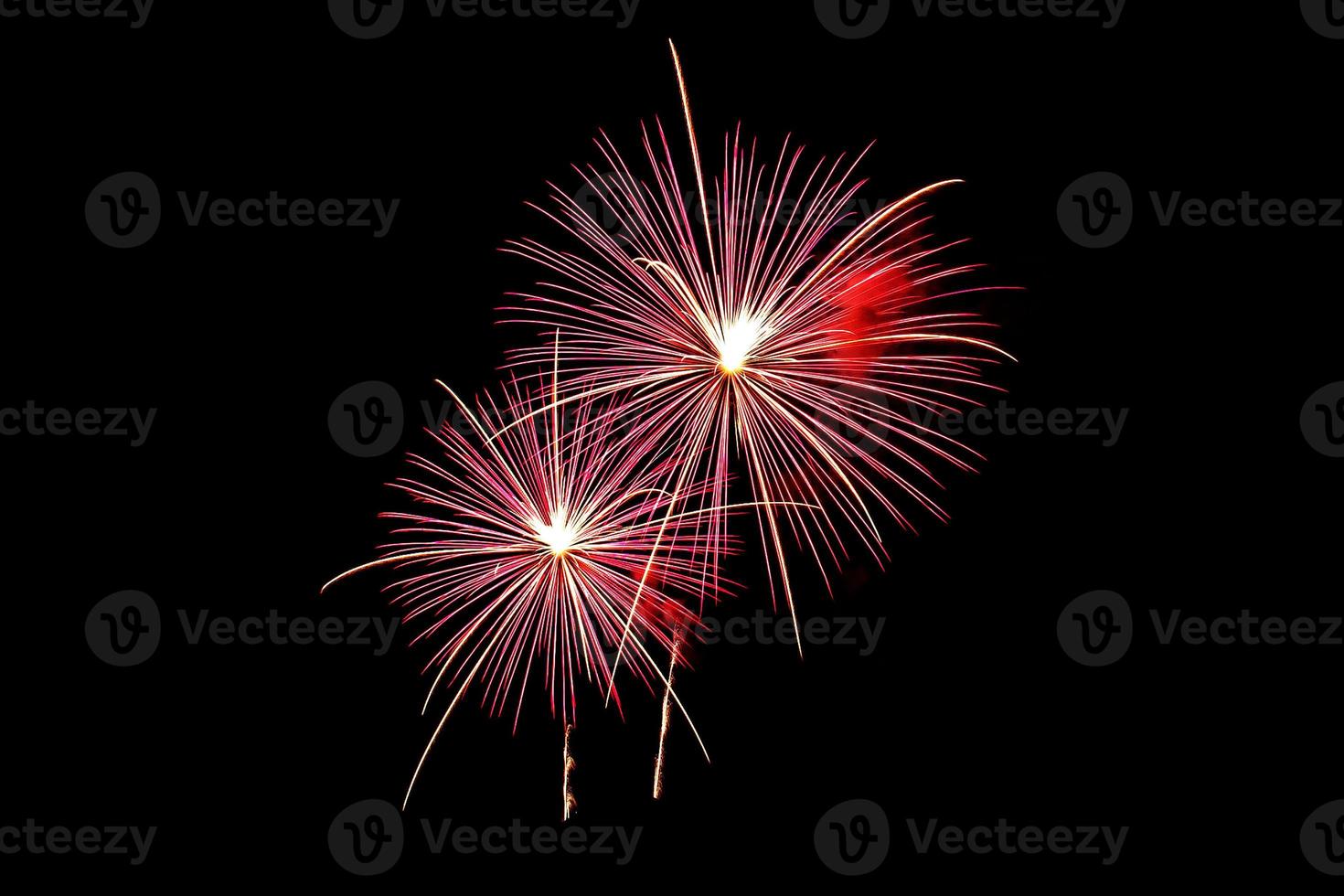 Abstract colored firework background light up the sky with dazzling display photo