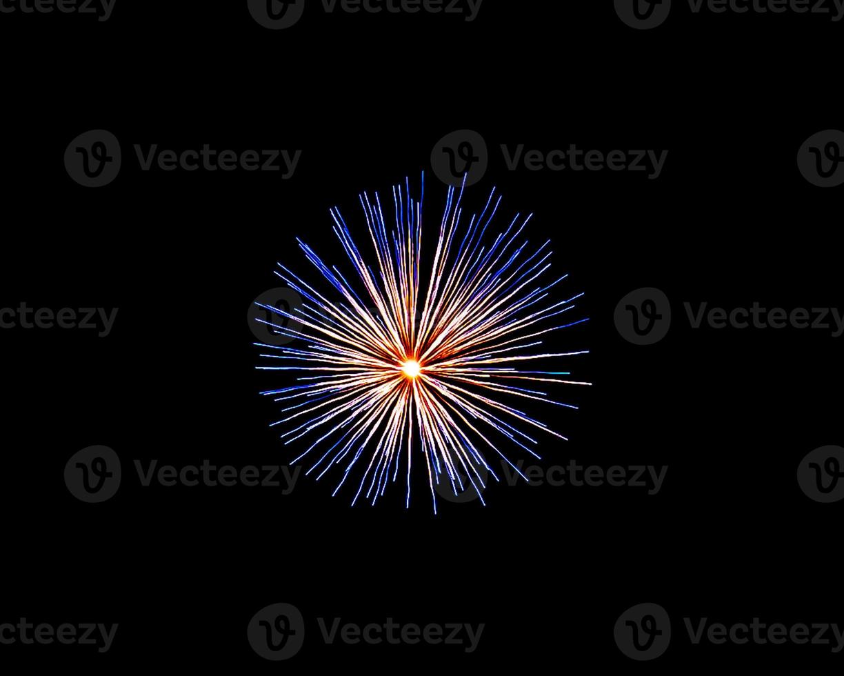 Abstract colored firework background light up the sky with dazzling display photo