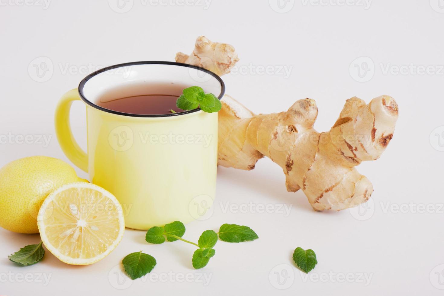 mint, lemon, ginger on a grey background. copy space photo